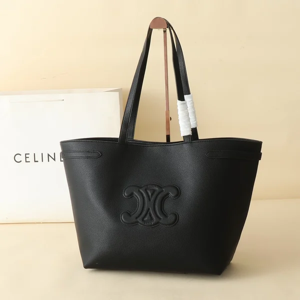 セリーヌ CABAS ANAIS トートバッグ黒、世界中のビジネスシーンで通用。黒粒面レザー、耐久性抜群。54cm幅大容量、PC・書類も余裕。両サイド絞り紐付き。ニューヨーク・ロンドン・シンガポール、国境を超えた信頼性。送料無料、即日発送。